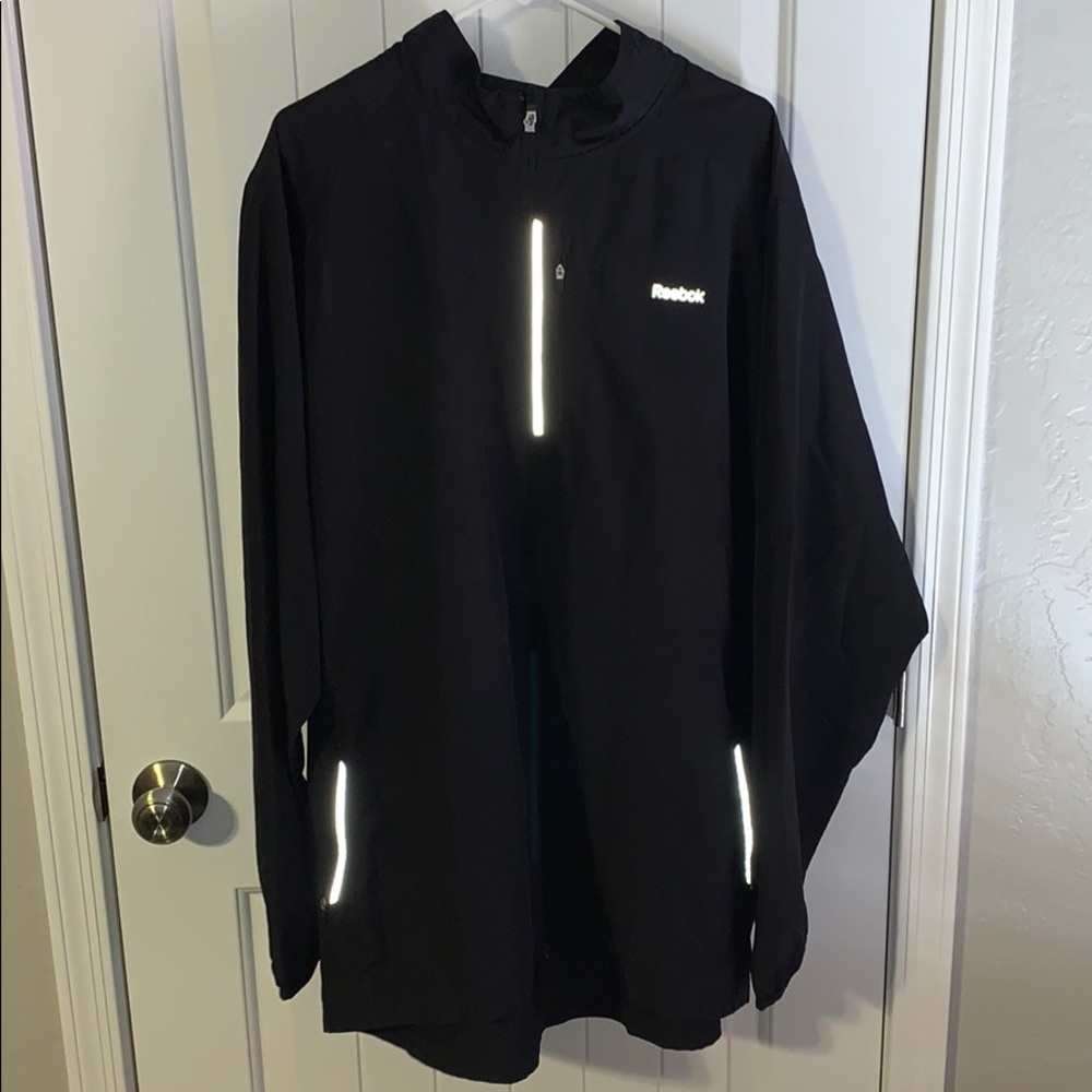 Reebok Full Zip Wind Breaker. Reflective markings